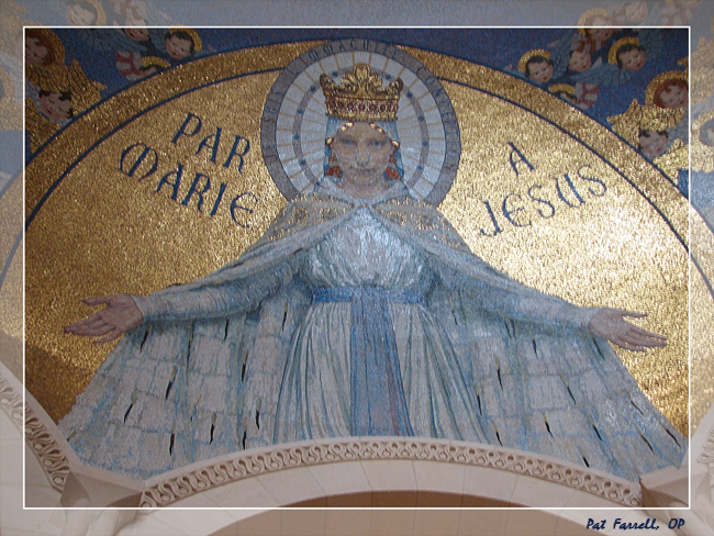 The welcoming arms of Mary from the mosaic in the dome of the basilica at Lourdes