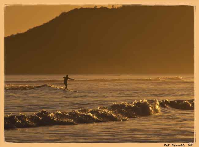 No matter the hour, this surfer certainly considers this moment to be golden