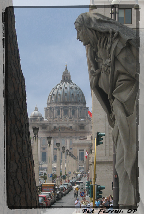 Traffic light in Vatican City by statue of St. Catherine of Siena 